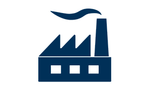 A simple dark blue icon of a factory with three roof peaks, three rectangular windows, and a tall chimney emitting a wavy plume of smoke, all on a white background.